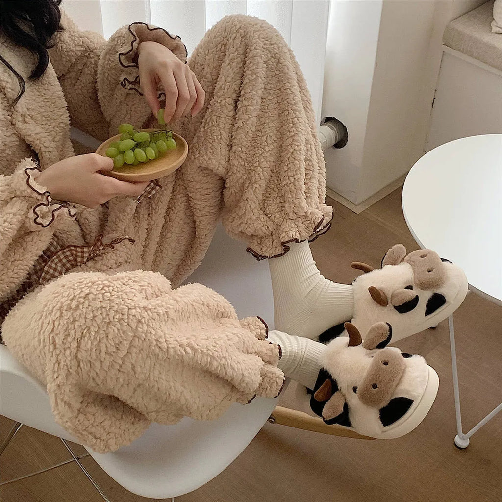 White cow print plush slippers for women with non-slip textured soles