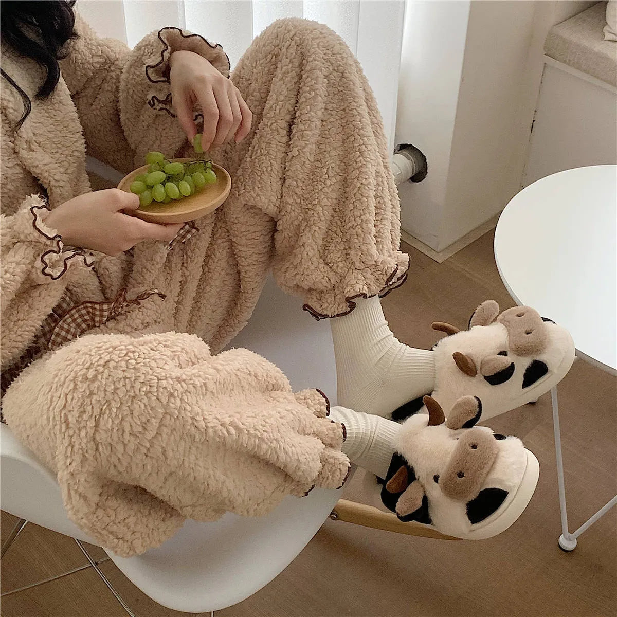 White cow print plush slippers for women with non-slip textured soles