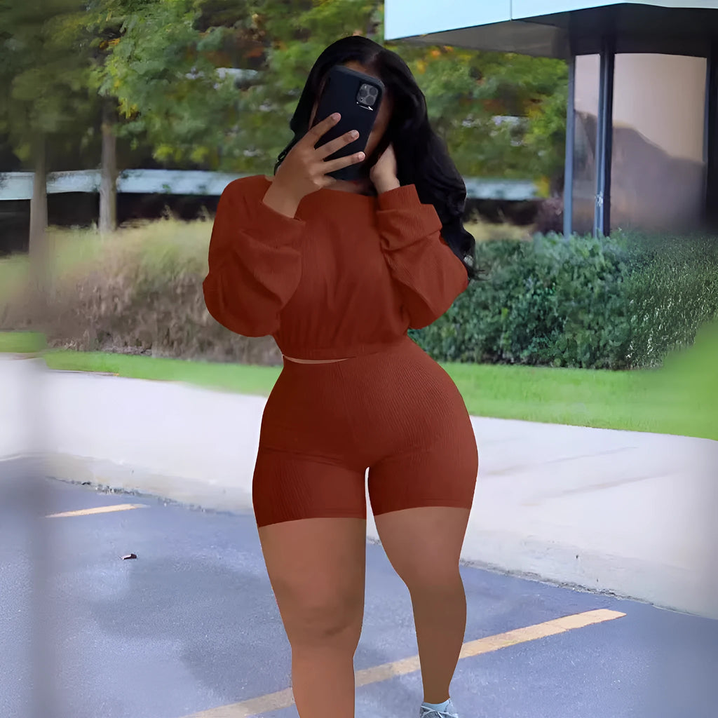 Women's off-the-shoulder long sleeve top and matching shorts in a sunken stripe solid colour two-piece set.