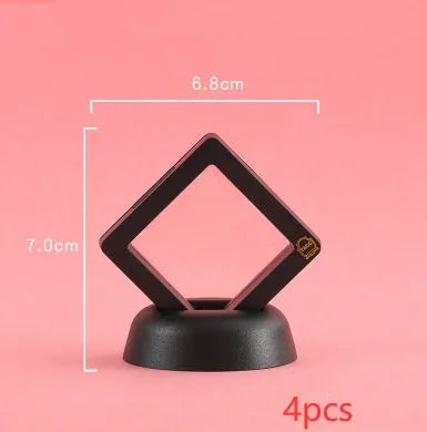 Transparent 3D floating display case holding a coin, with black and white size options