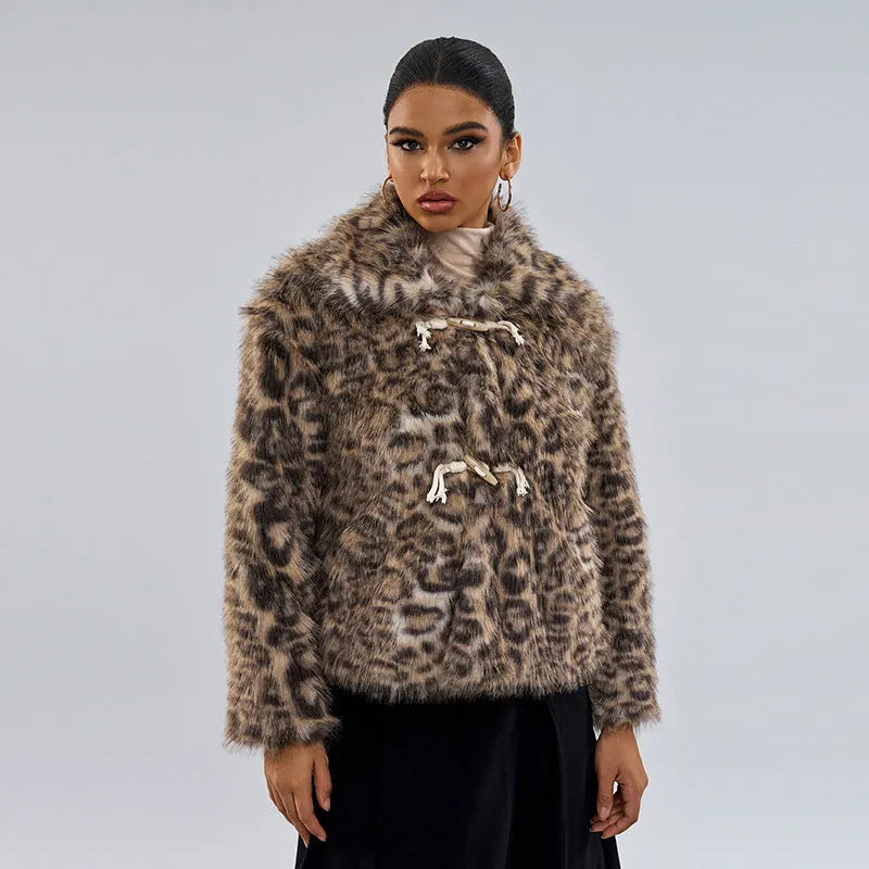 Leopard print women's coat with a buckle lapel fastening and regular sleeves.