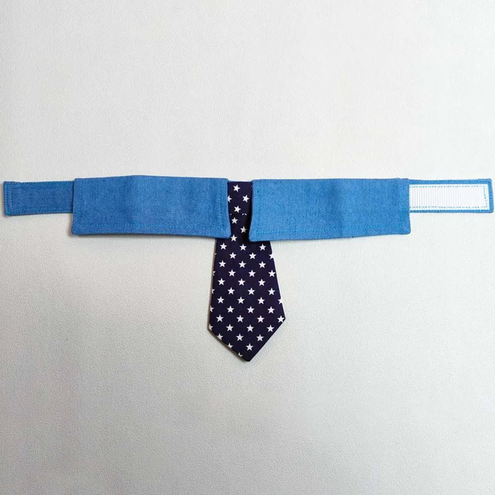 Denim pet collar with star pattern necktie, adjustable fastener tape, on a light background