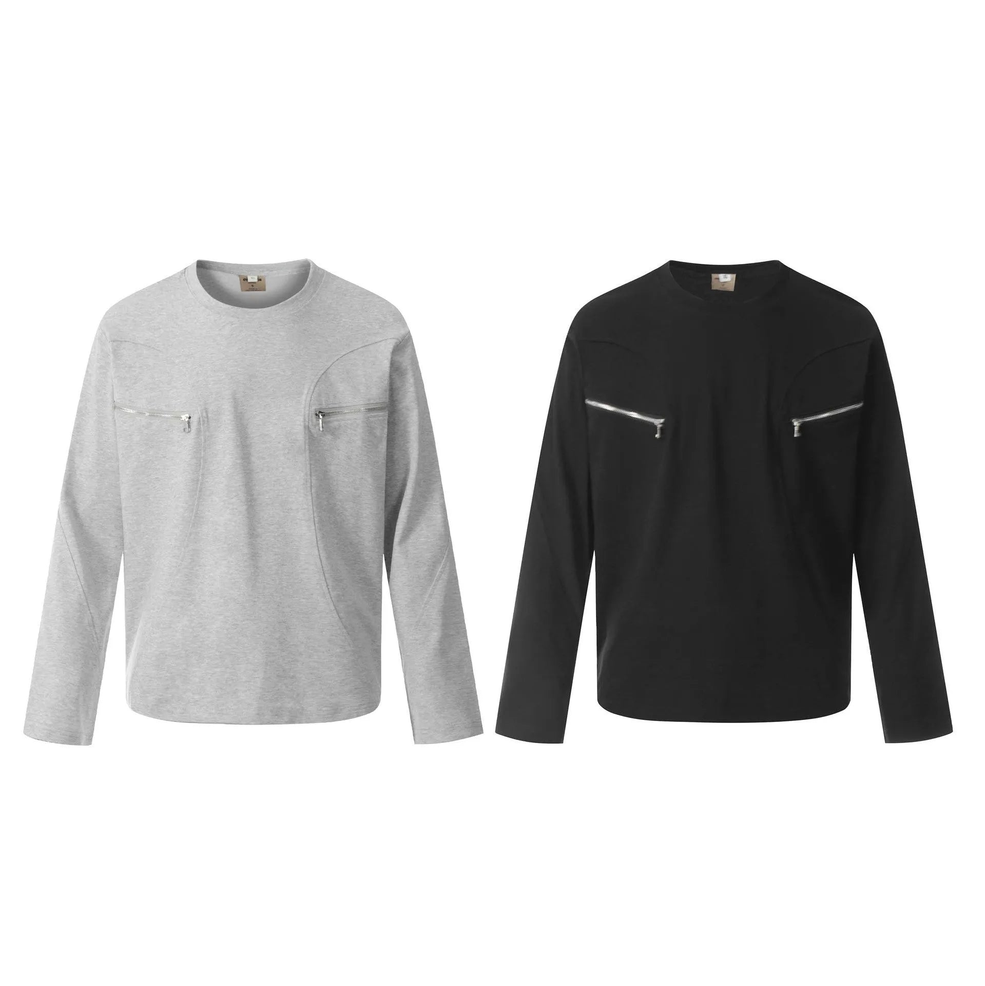 A loose-fitting long sleeve cotton pullover in grey, shown on a model for casual wear.
