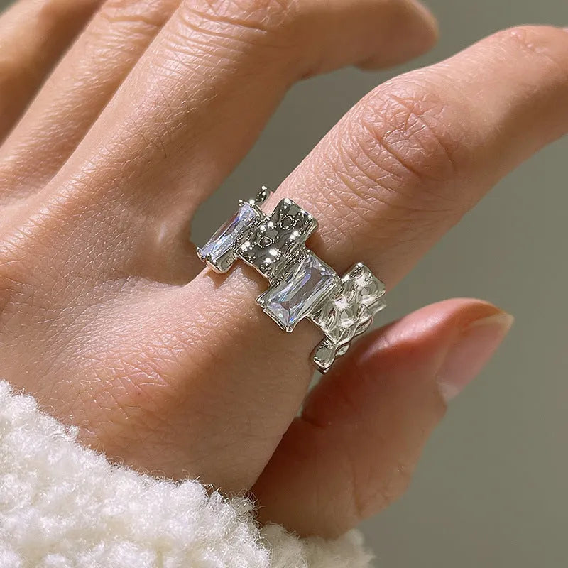 Open geometric silver ring with cross zircon pattern in retro style