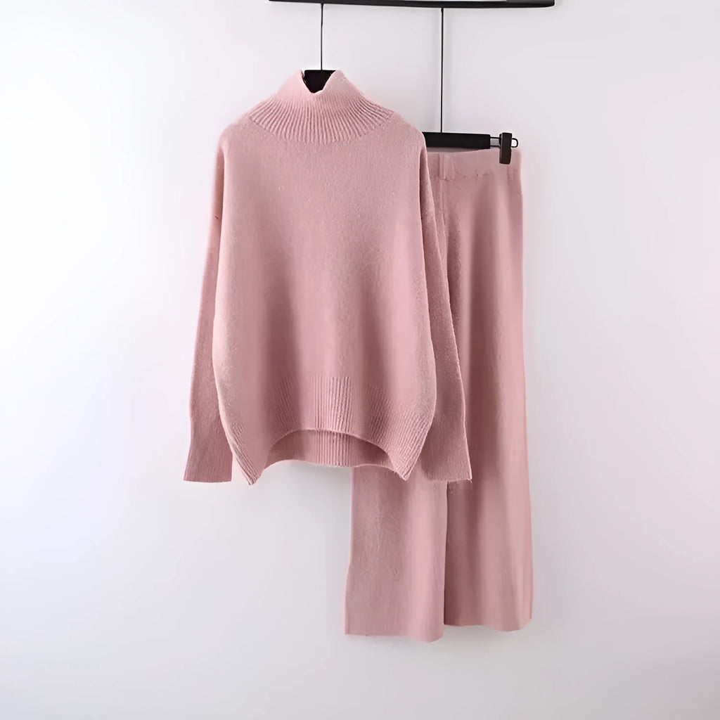 Women's casual two-piece set with long sleeve sweater and wide leg trousers in a solid colour.