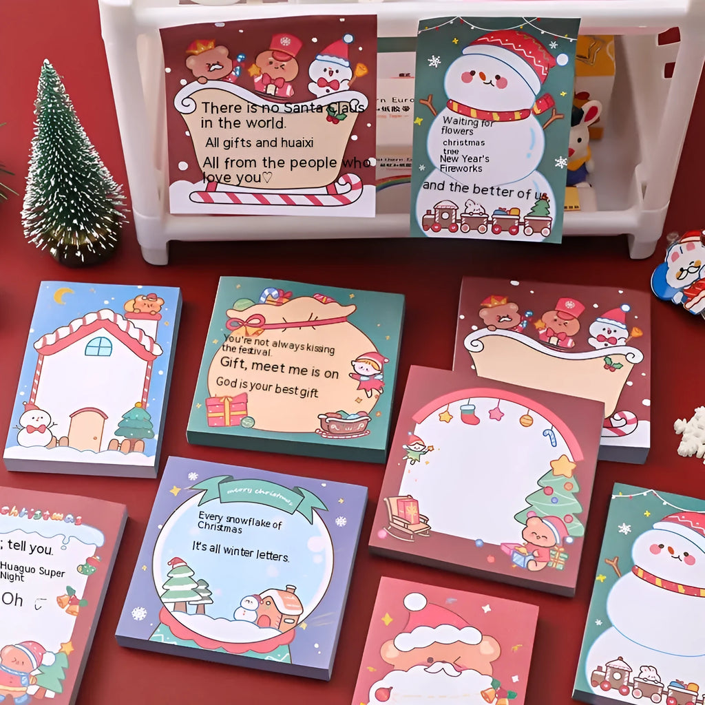 Set of cartoon Christmas sticky notes with 8 designs including Santa, Elf, Reindeer, and Snowman on a white background