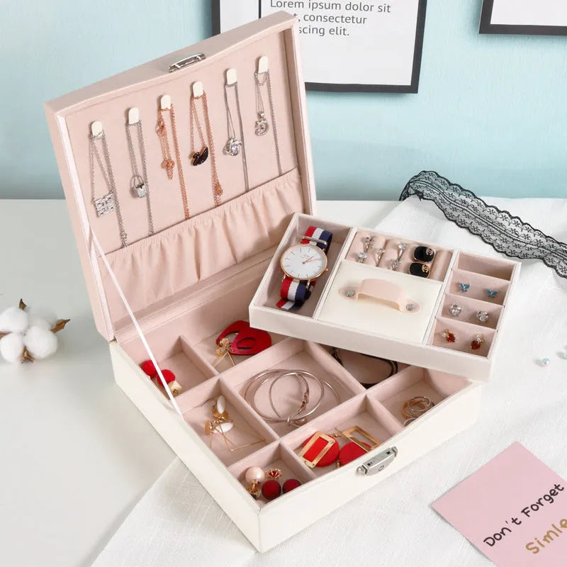 Red PU leather jewellery storage box with large capacity for rings and necklaces.