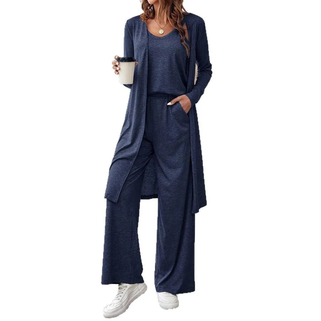 Blue women's three-piece suit set showing long cardigan, trousers, and sling top