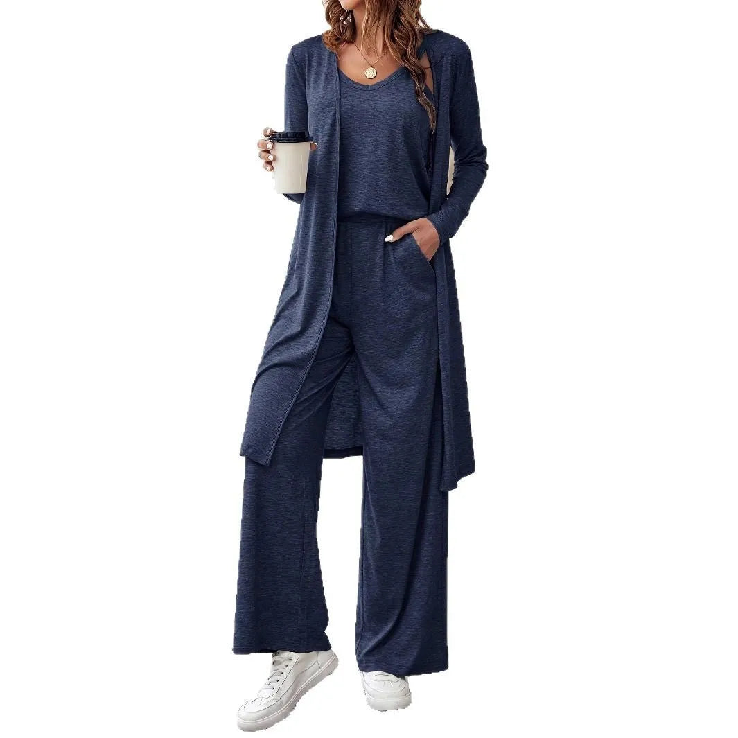 Blue women's three-piece suit set showing long cardigan, trousers, and sling top