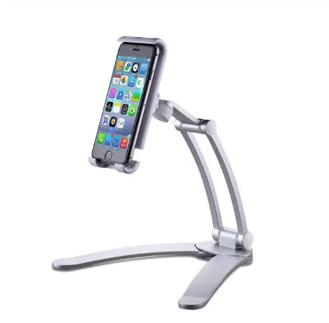 Silver aluminum desktop tablet stand with white ABS base, showing adjustable clip holding a tablet.