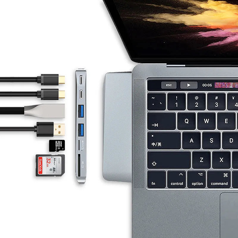 8-in-1 USB-C expansion hub for MacBook Pro with dual plugs, USB ports, card readers, and SSD slot