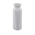 Grey melamine plastic vase with a wide 7.2cm base on a wooden table.