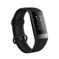Black smart bracelet with screen showing blood pressure and heart rate data on a wrist.