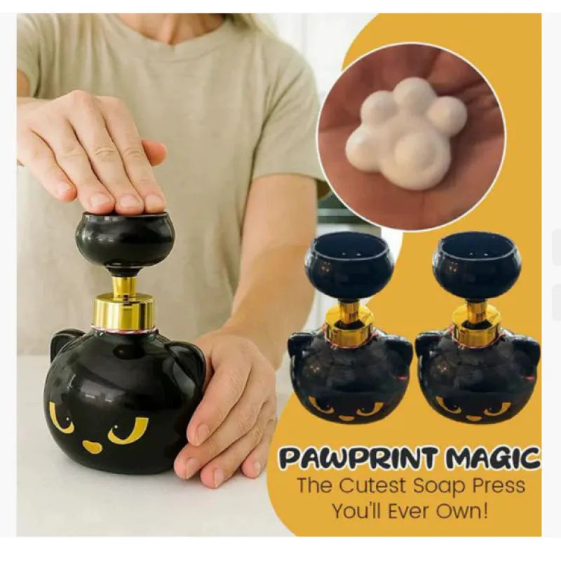 Black plastic cartoon cat shaped manual soap dispenser, 18cm tall.