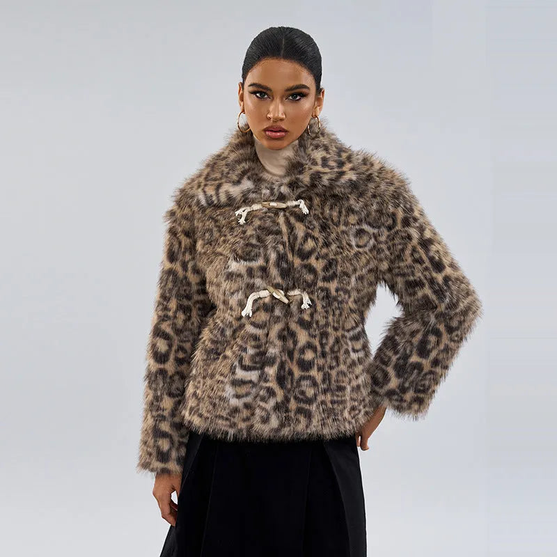 Leopard print women's coat with a buckle lapel fastening and regular sleeves.