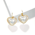 A pair of gold-coloured alloy ear clips for women in a natural style.
