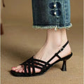 Retro-style women's sandals with thin cross straps, an ankle buckle, and a square toe in a light brown colour.