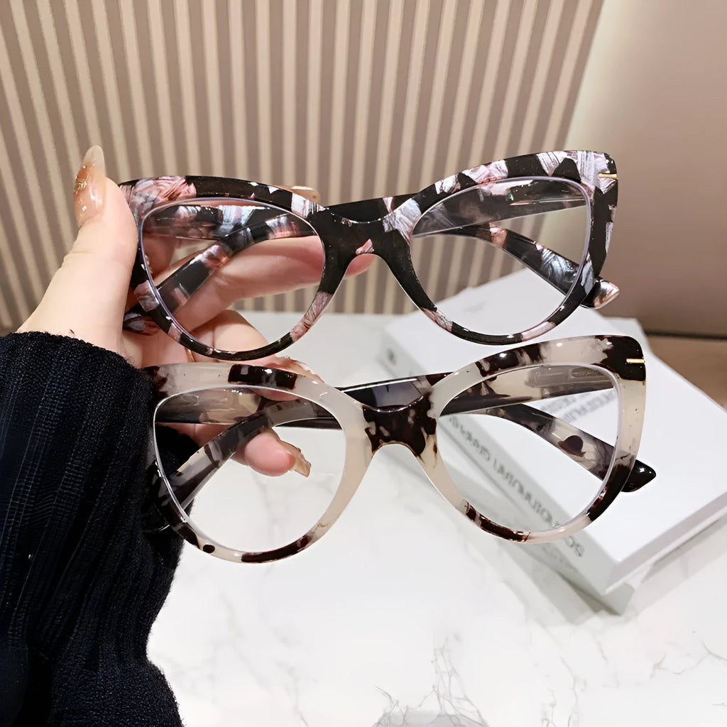 Women's large frame cat's eye reading glasses with dragon and phoenix decorations on the temples.
