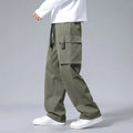 Boys straight cargo pants in army green with large side pockets and drawstring waist on white background