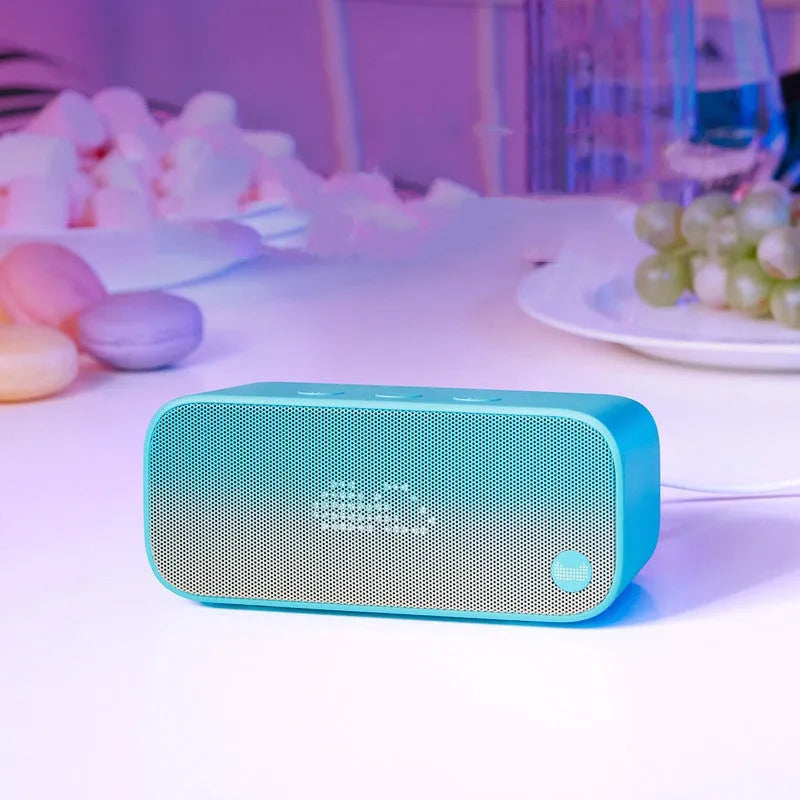 Smart Wi-Fi speaker with AI intelligence in blue, green, red, or white colour options, front-firing bookshelf design