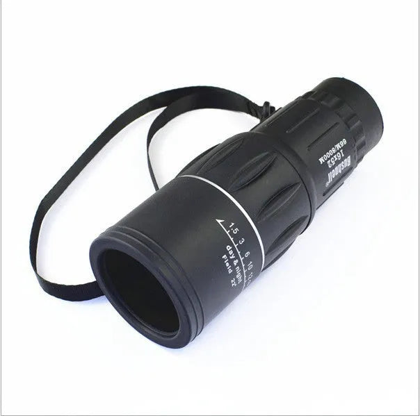 16x52 black monocular with BAK4 roof prism and green film coating on a white background