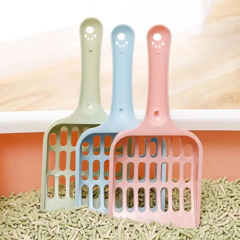 Blue plastic cat litter scoop showing 20cm length and 9cm wide head for cleaning pet toilet trays.