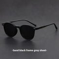 Ultra-light round frame retro sunglasses with polarised UV protection lenses in Sand Black colour