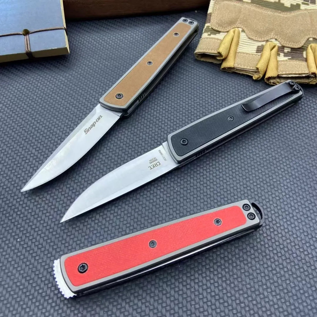 CRKT 7190 folding fruit knife showing black stainless steel blade and handle with dimensions displayed