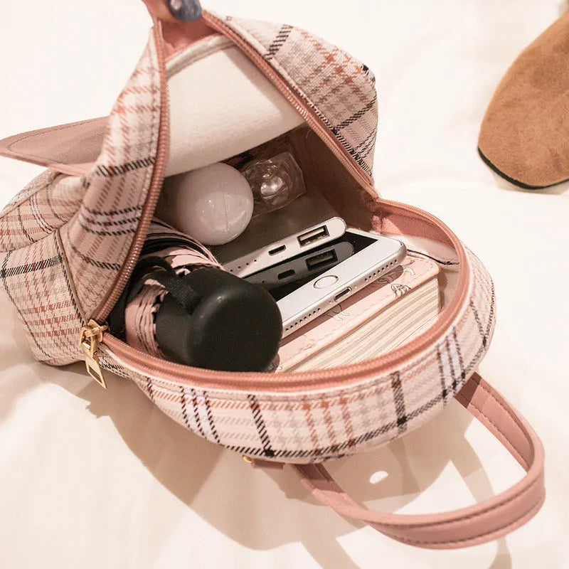 Black one shoulder diagonal PU leather phone bag worn across the body