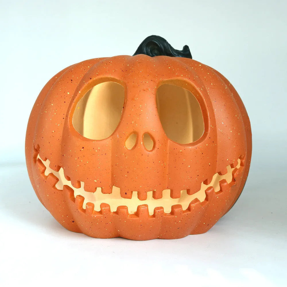 Halloween pumpkin lantern with scary hollow-out skull design in yellow resin, 23x19cm