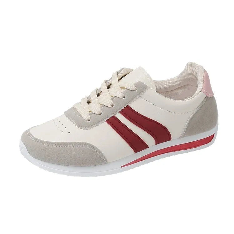 Red and blue lace-up low-top running sneakers with a PU mesh upper and flat rubber sole.