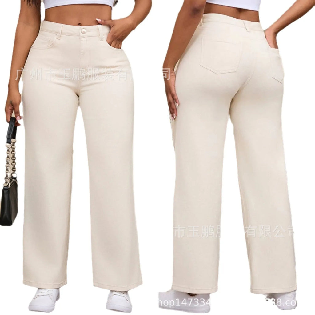 Women's high waist wide leg jeans in apricot colour on a hanger.