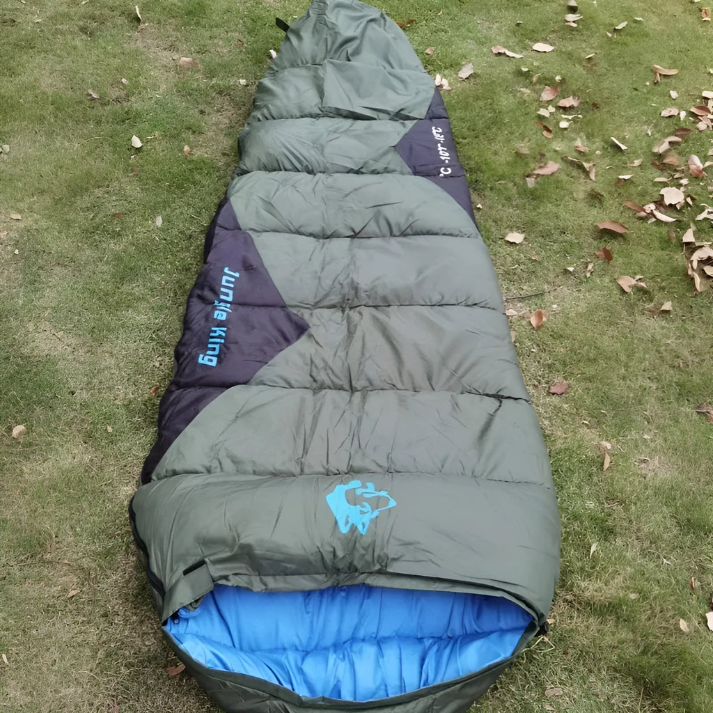 Army green cotton sleeping bag with compression sack for camping, shown with dimensions 230cm by 80cm.