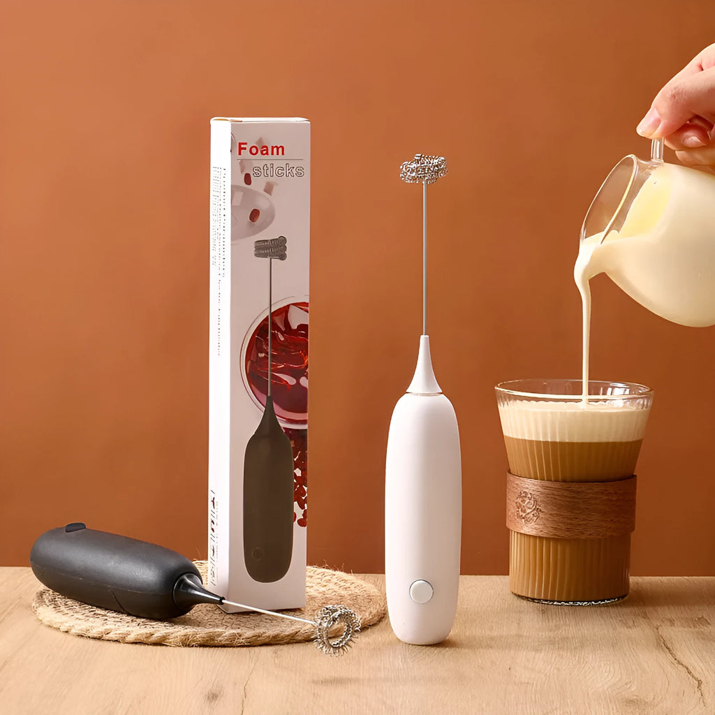Black and white handheld electric milk frother blender for coffee beverages