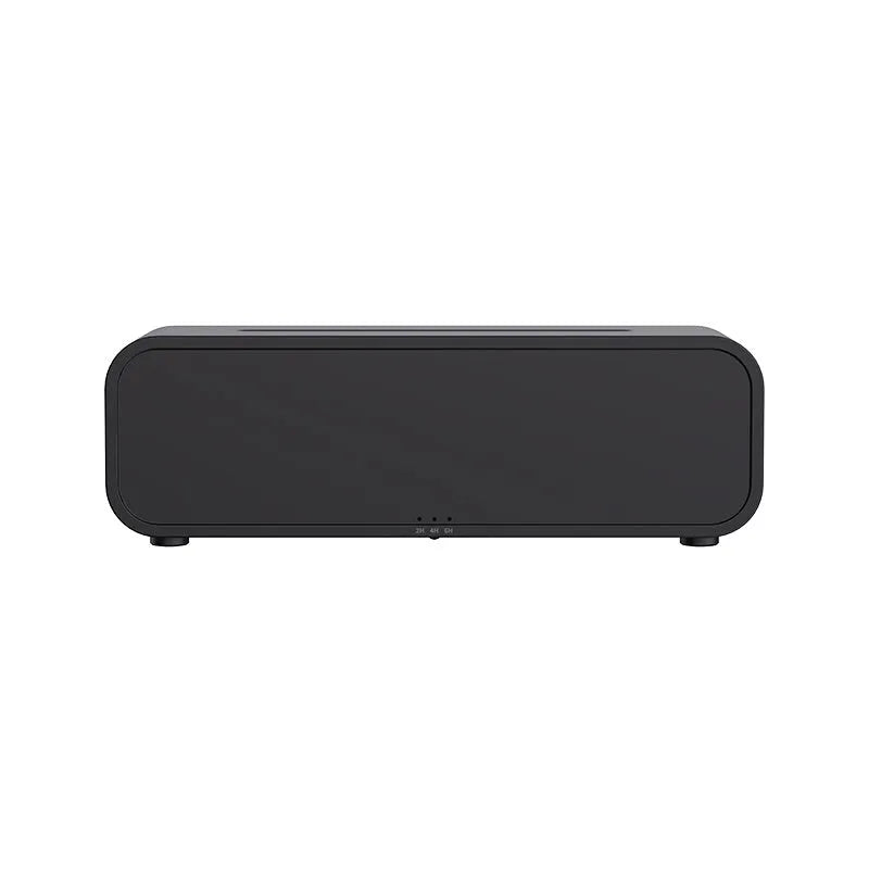 Black flame design aroma diffuser with remote control on a wooden table