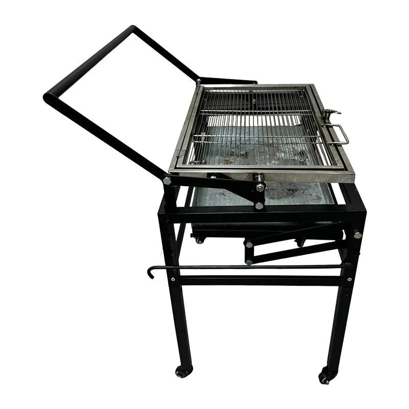 Foldable large charcoal barbecue grill shown in a garden setting