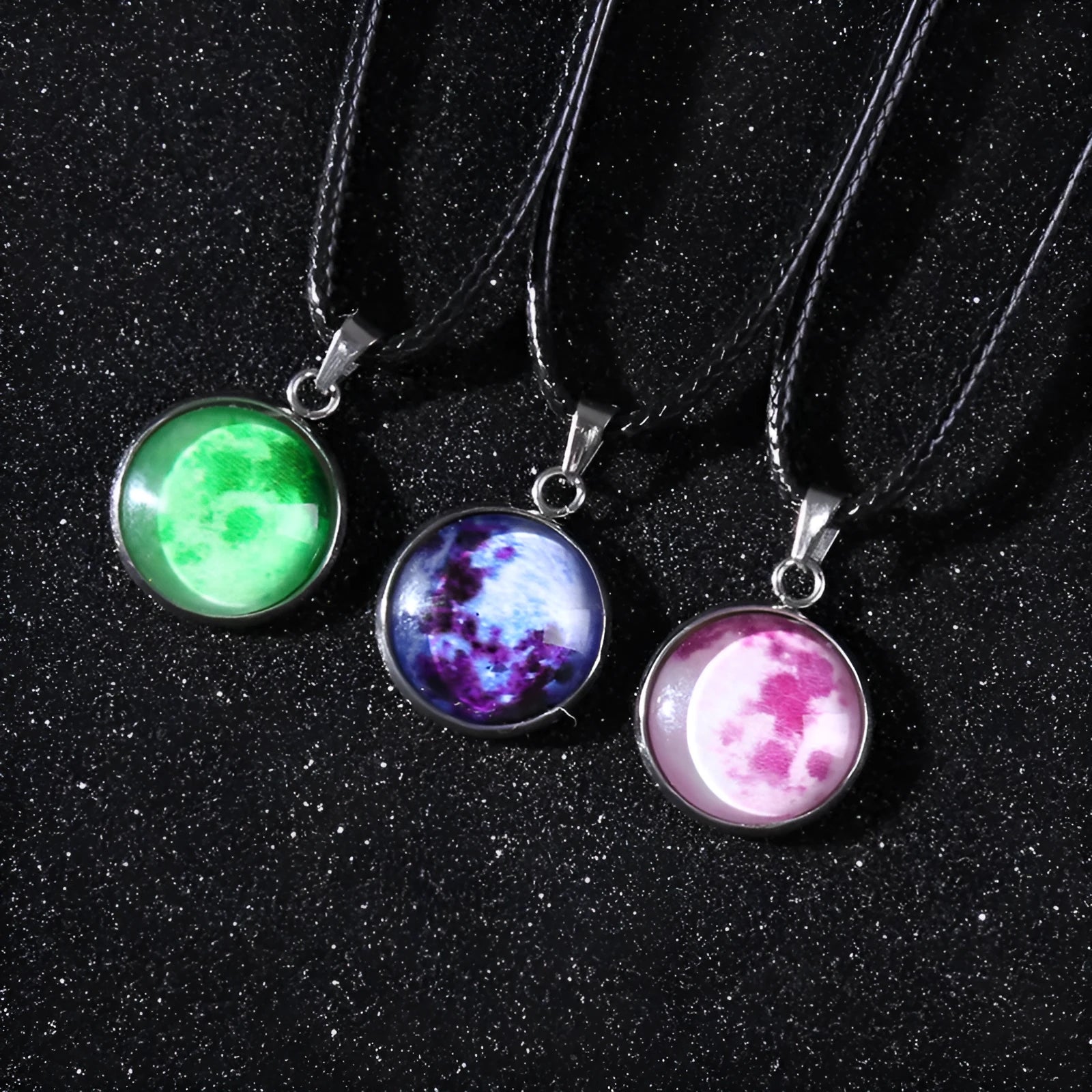 Constellation night sky pendant necklace with luminous alloy and organic glass on an adjustable chain.