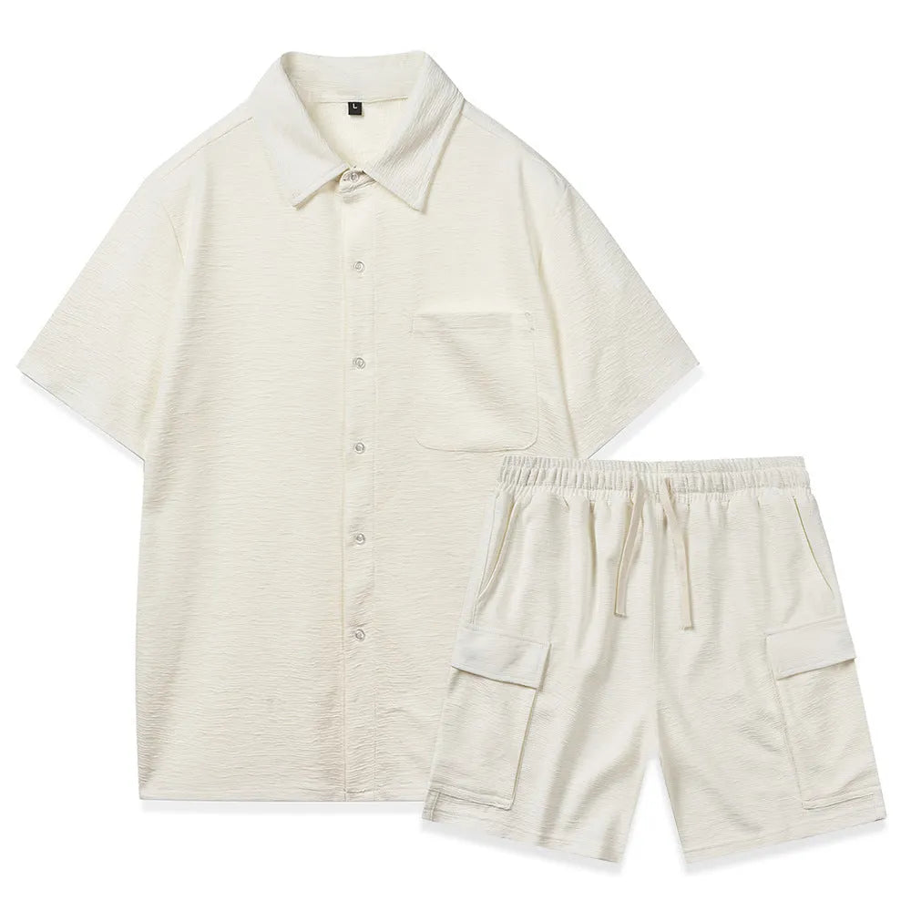 Women's beige polyester shorts set with short sleeve top and elastic waist shorts laid flat.
