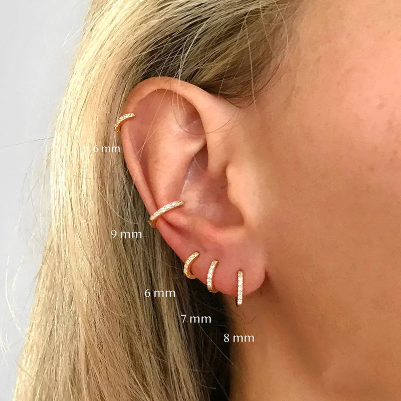 Circle zircon perforated stud earrings showing gold, rose gold and silver colour options with different diameter sizes