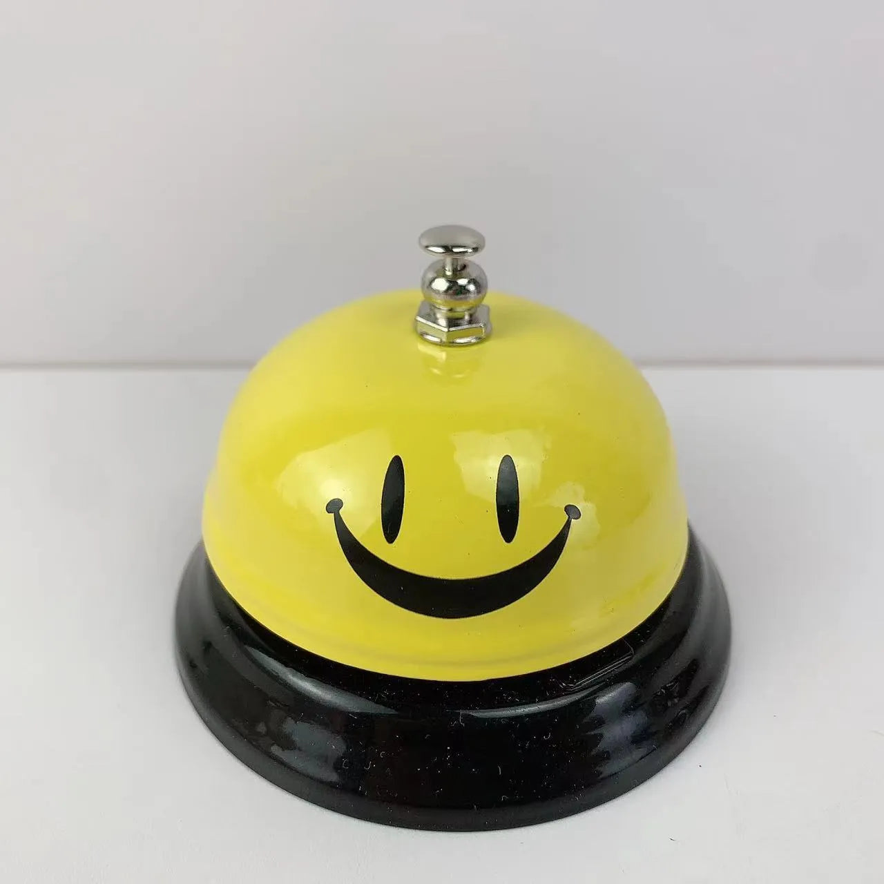 Iron game alarm bell in one of 11 available colours including red, blue, green, pink, and yellow.