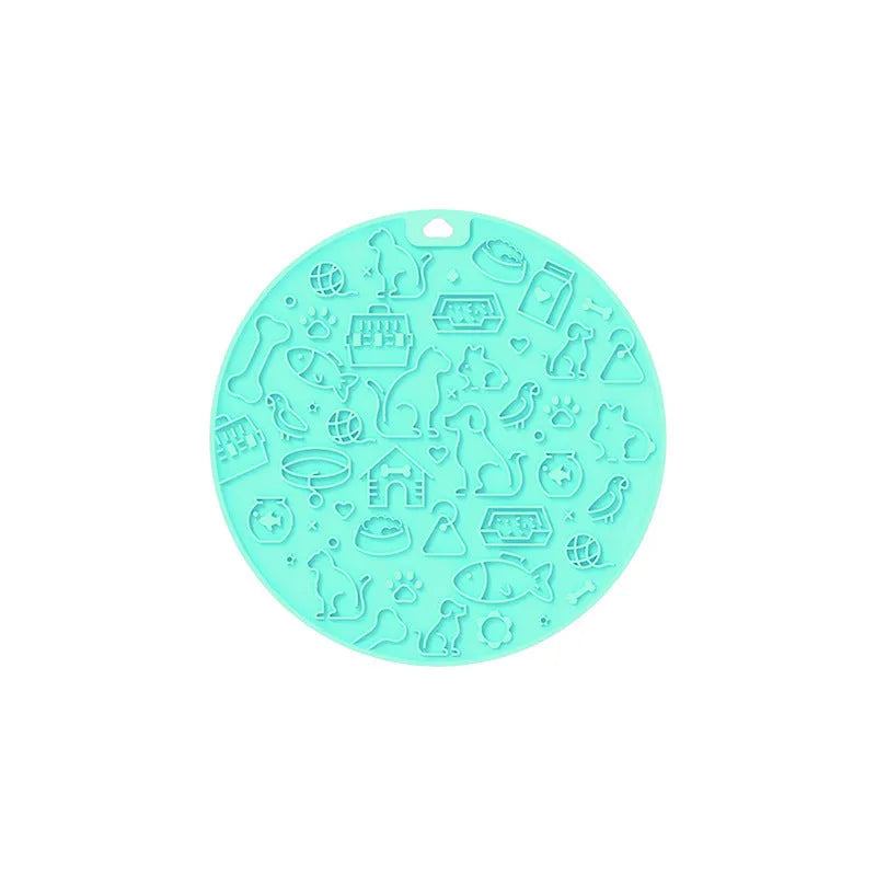 Round silicone pet licking mat with textured grooves and a sucker base, shown in blue colour.