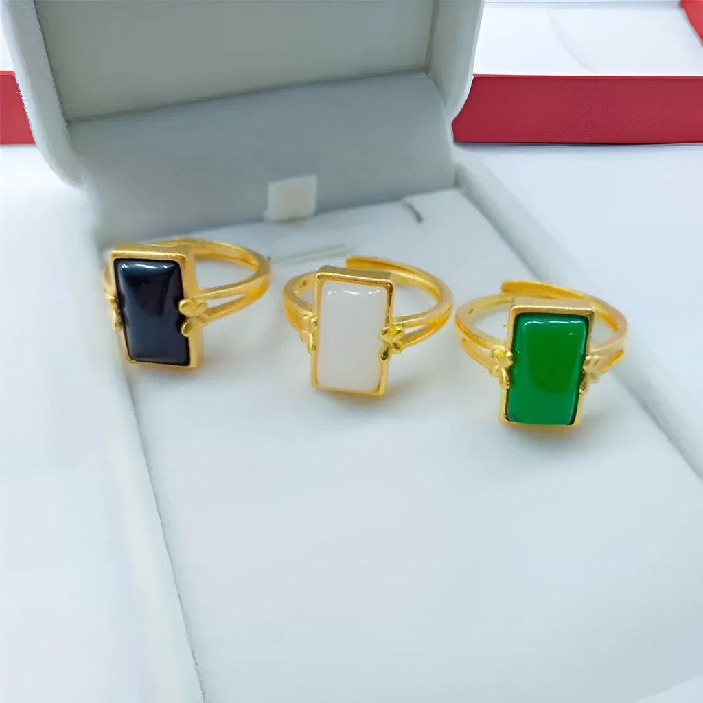 Adjustable brass ring with gold-plated finish and electroplated gemstone inlay