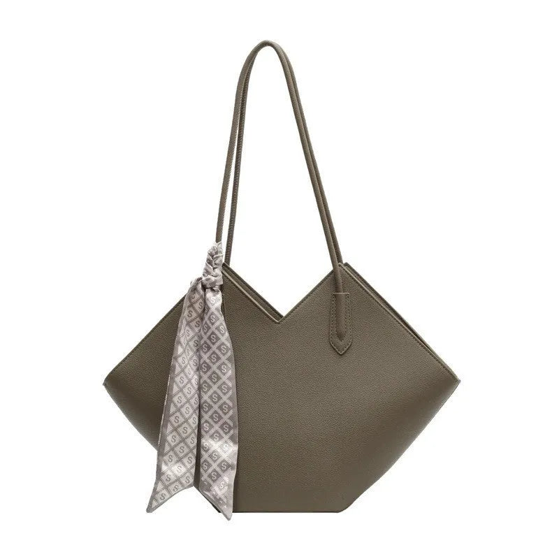 Women's large black PU shoulder bag with an outer pocket, shown in a horizontal square shape.