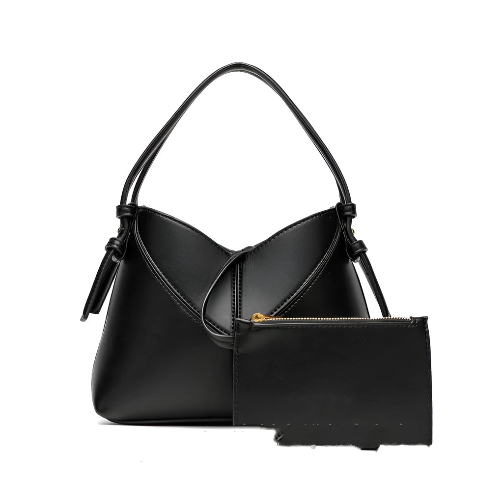 Trendy solid colour stitched oval handbag and crossbody bag for women in black with single shoulder strap and interior slip pocket