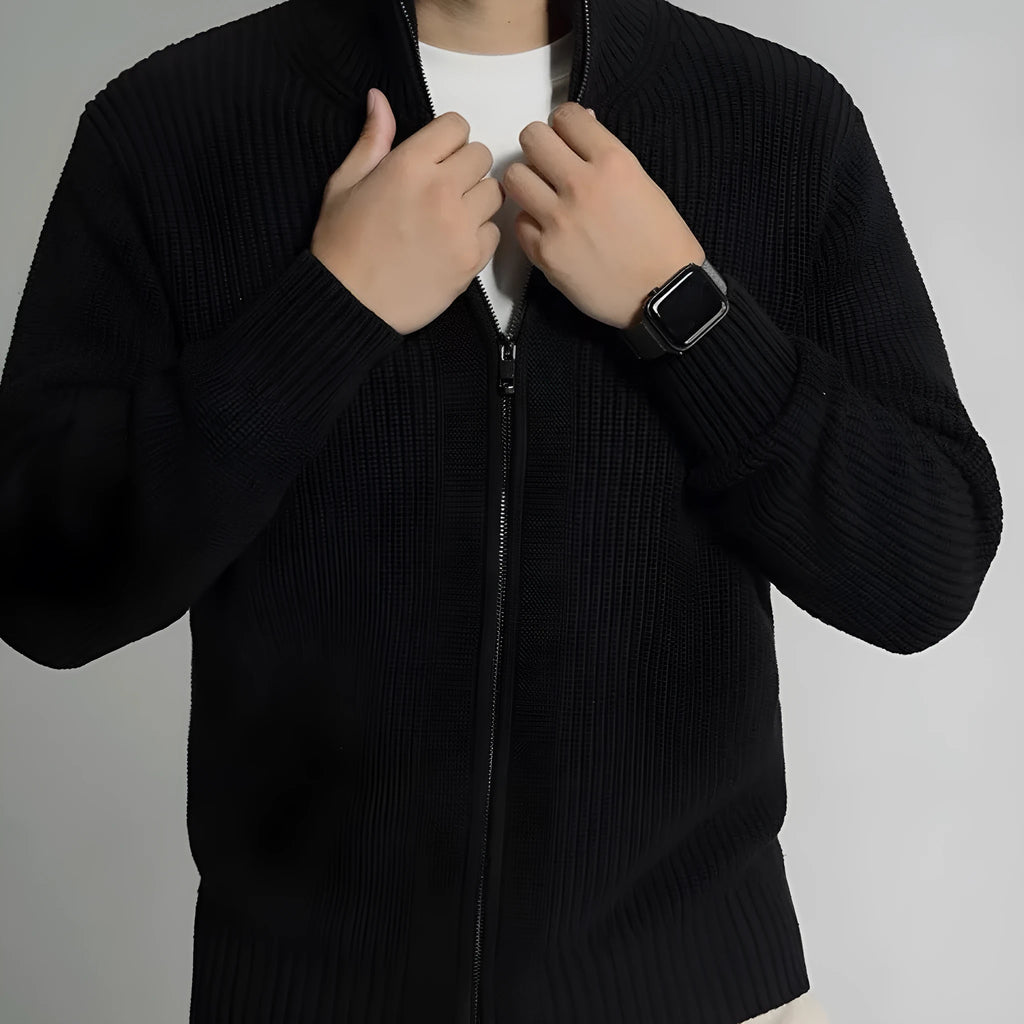 Men's loose fit black modal cardigan sweater on model, front view, size L