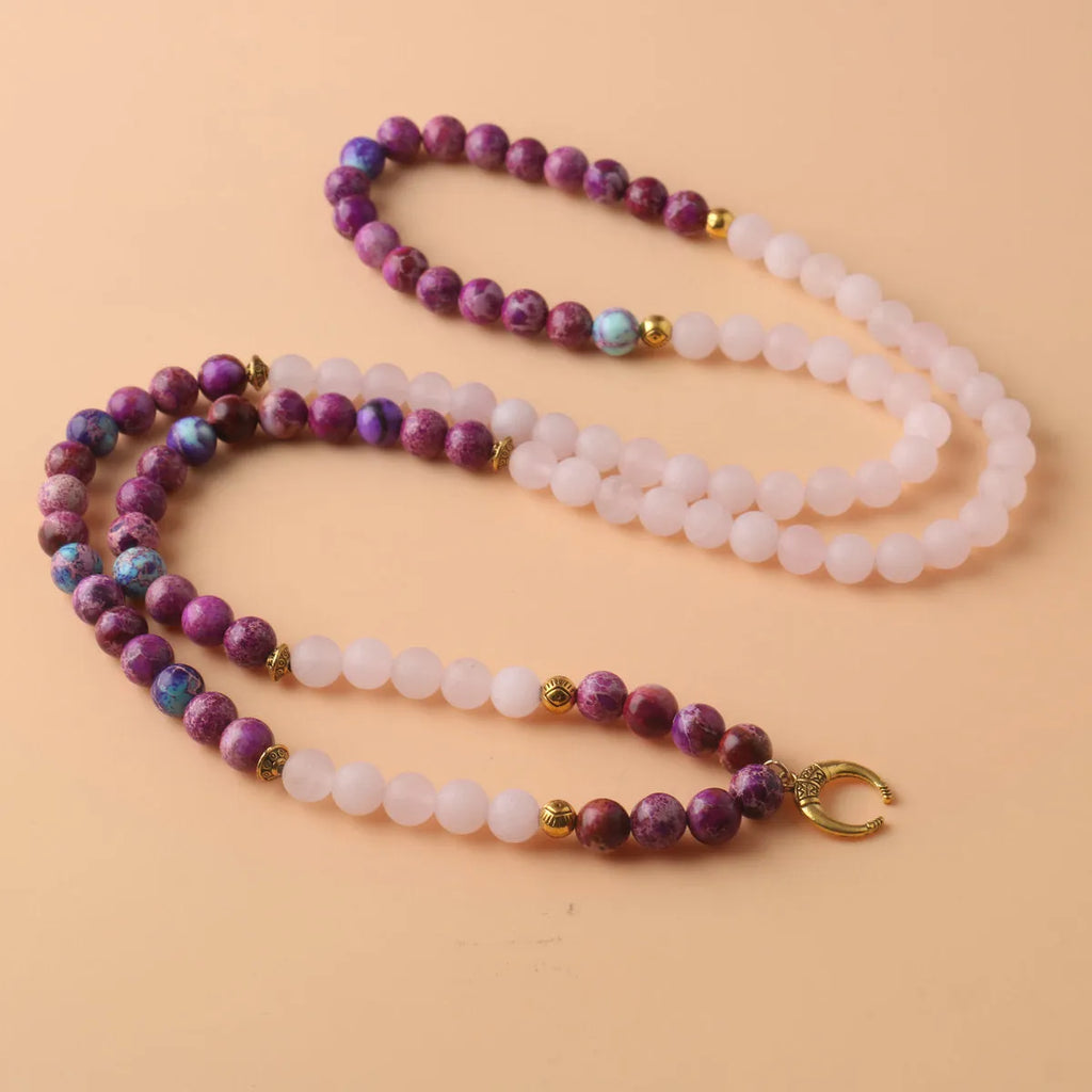 Pink crystal Emperor Stone round pendant necklace on a casual chain