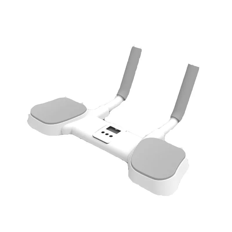White household flat support trainer with alloy aluminium frame on a wooden floor.