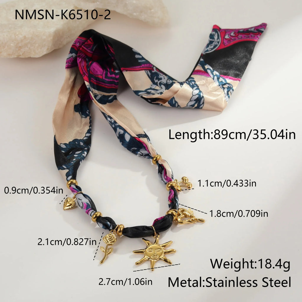 Women's stainless steel jewellery with 18K gold electroplating for autumn winter scarf coordination