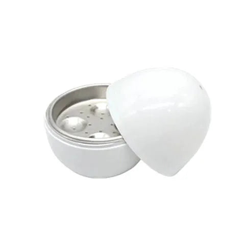 White microwave egg steamer in egg shape with lid, holds up to 4 eggs for hard or soft boiled cooking
