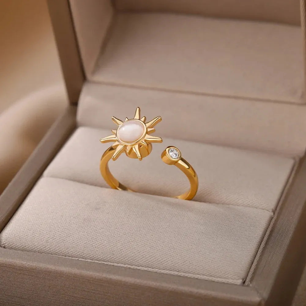 Simple geometric decompression ring with adjustable opening in gold electroplated finish